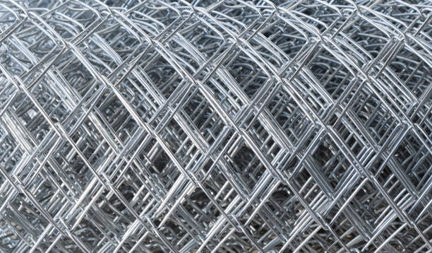 Close-up of Cages, grids, steel mesh for industrial use and animal-livestock raising. Close-up of Cages, grids, steel mesh for industrial use and animal-livestock raising. grill rods stock pictures, royalty-free photos & images