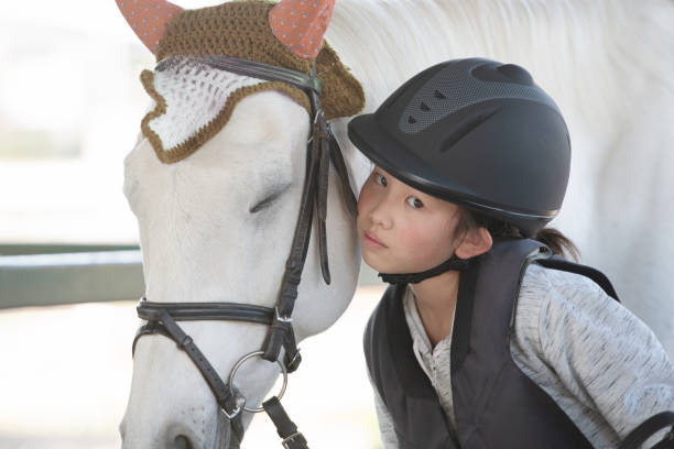 istock A child who is good friends with horses 1842616013