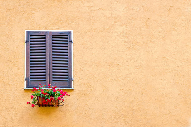 istock Old window with wooden shutters 184262403