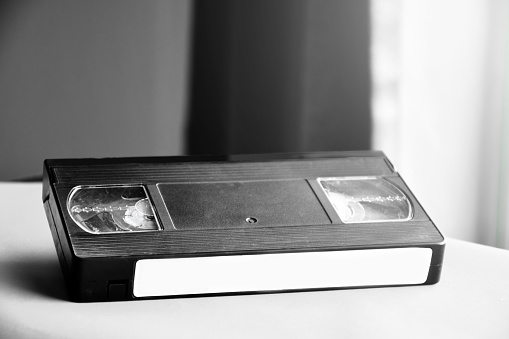 Closeup vhs video cassette tape, soft focus.