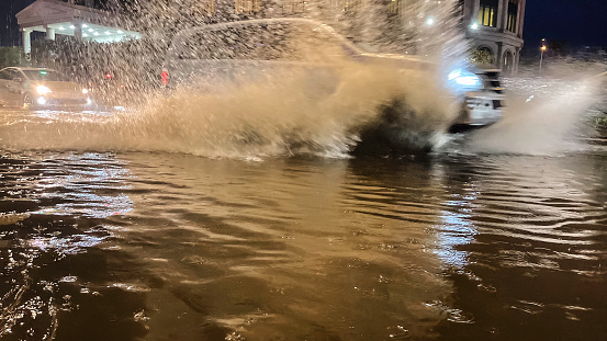 City street in the evening in stormy weather