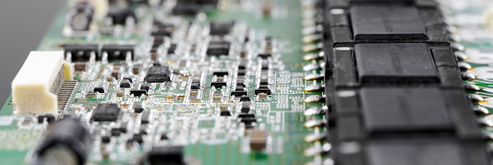 Microcircuit macro photography. Banner. Electrical components close-up. Nano technology. Capacitors and microchips