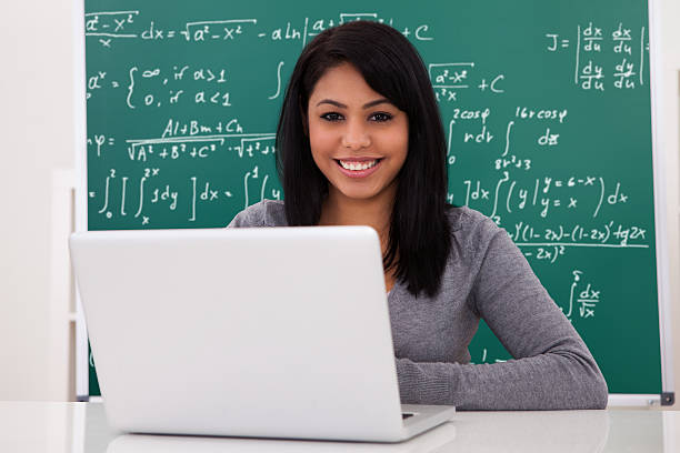 istock Portrait Of Female Student Using Laptop 184265927