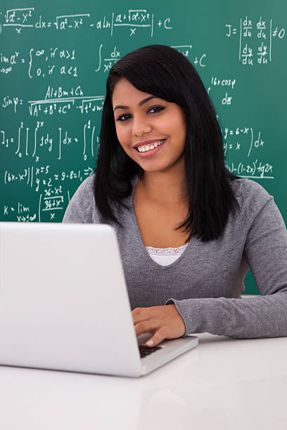 istock Portrait Of Female Student Using Laptop 184265996