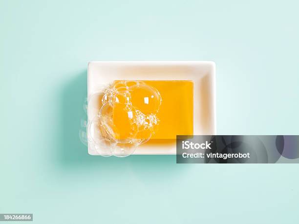 Orange Soap In A Dish Stock Photo - Download Image Now - Bar Of Soap, Soap Sud, Orange Color