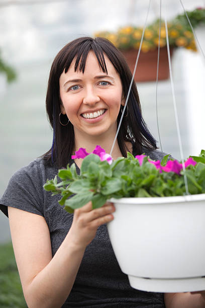 istock Woman in Greenhouse 184267478