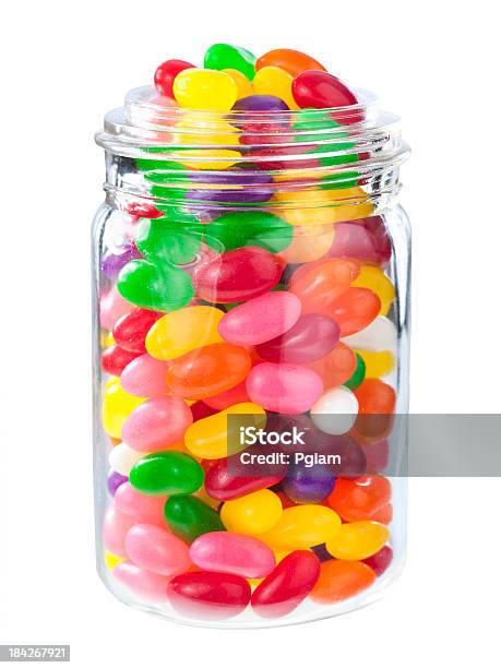 Jelly Beans En Un Pote Foto de stock y más banco de imágenes de Caramelo de goma - Caramelo de goma, Pote, Fondo blanco