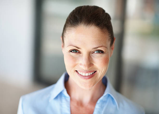 istock Pretty business woman smiling 184268289