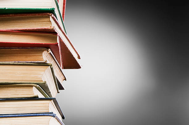istock Stack of worn leather-bound vintage books with copy space 184268318