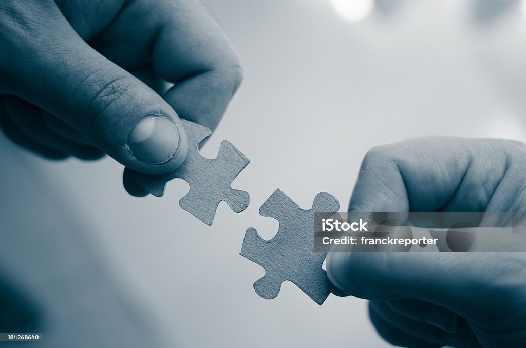 Famiglia lavoro di squadra, puzzle di connessione - Foto stock royalty-free di Accordo d'intesa