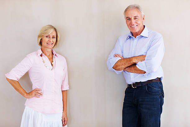 istock Senior couple leaning against wall 184269090
