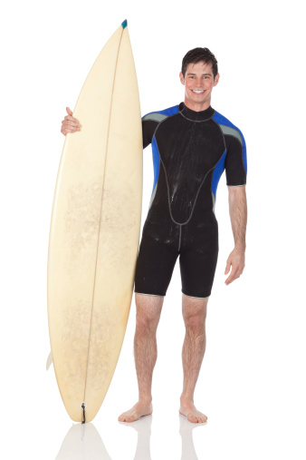 Man standing with a surfboardhttp://www.twodozendesign.info/i/1.png