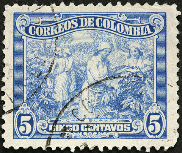 istock women picking coffee on an old Colombian postage stamp 184270148
