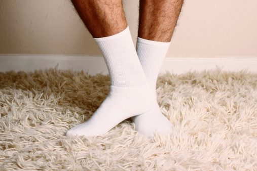 Man wearing white cotton socks.