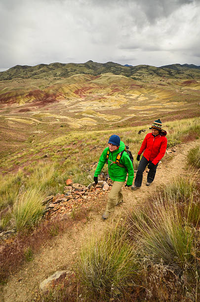 Hikers on a stormy day stock photo