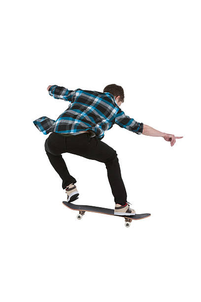 istock Rear view of a man skateboarding 184270845