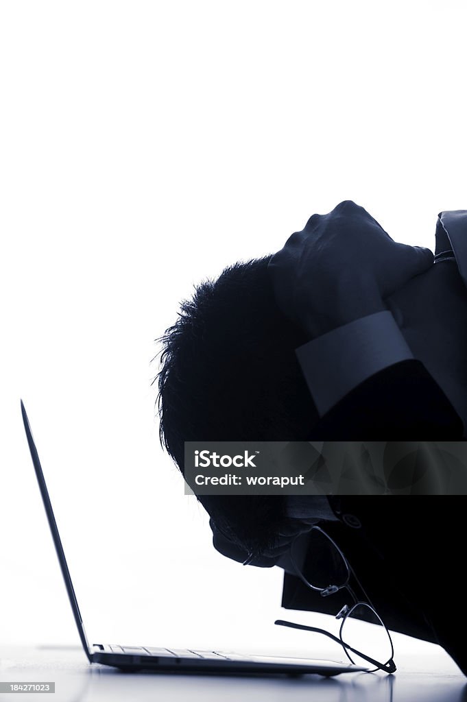 Silhouette of Businessman. Black and white silhouette of businessman with computer labtop. Adult Stock Photo