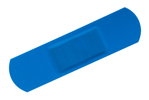 A studio shot of a blue waterproof bandaid isolated on a white background with a clipping path