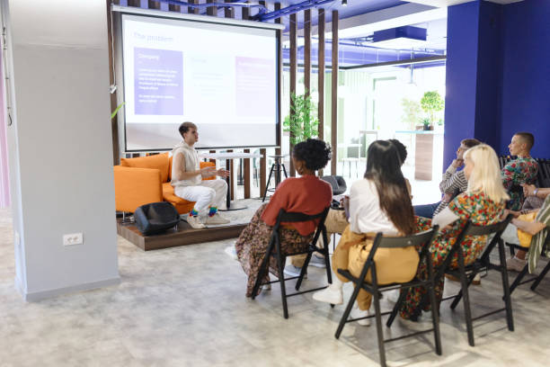 istock Man presenting his ideas in the modern IT company 1842722795