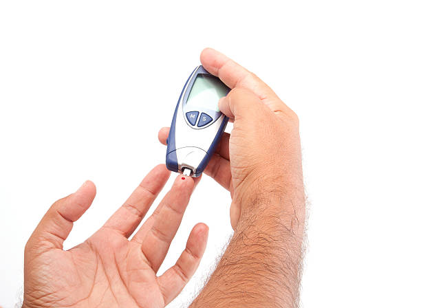 test de sucre - meter diabetes blood scrutiny photos et images de collection