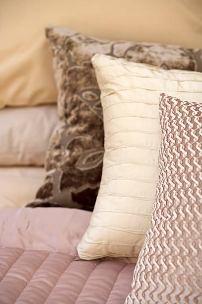 istock silk cushions and pillows on a bed 184273207