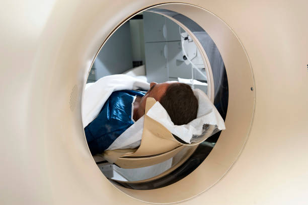 istock Man Receiving a Medical Scan,Rear View 184273355