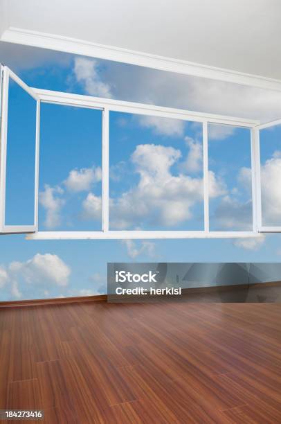 Empty Room With Mural Of Blue Sky White Clouds And A Window Stock Photo - Download Image Now