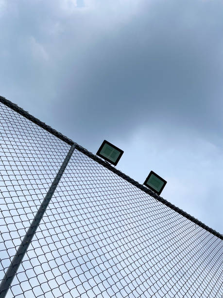 istock sports field iron net with lights 1842738750