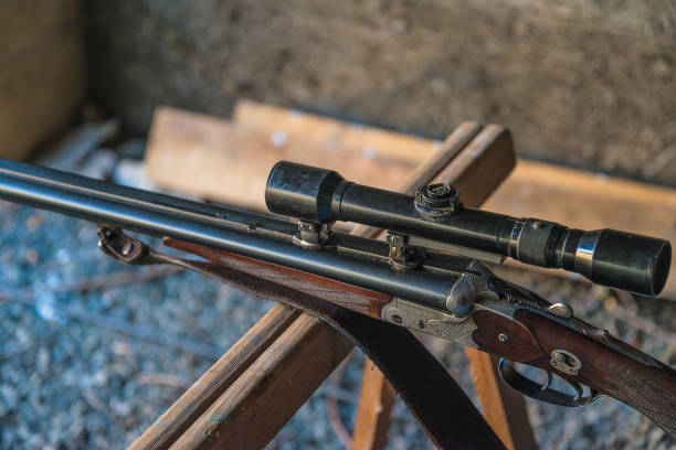 istock Close up for one rifle and hand on the optical sight; 1842740849