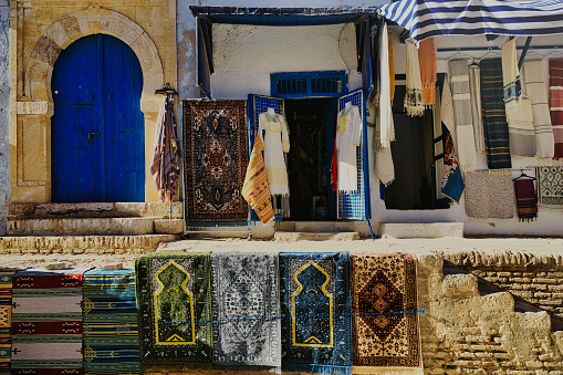 Local souvenirs and carpets in a Tunisian market, Kairouan, Tunisia