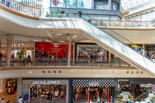 Busy scene with shoppers on escalators inside the Bullring Shopping Mall in Birmingham, West Midlands, UK Busy scene with shoppers on escalator inside the Bullring Shopping Mall in Birmingham, West Midlands, UK on 23 July 2023 Bullring stock pictures, royalty-free photos & images