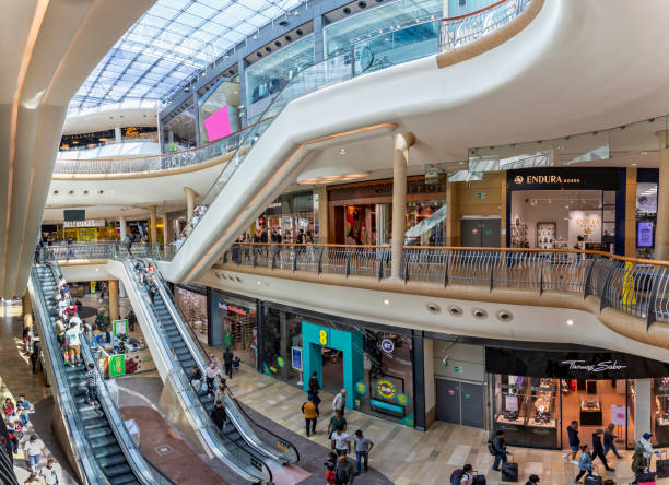 Busy scene with shoppers on escalators inside the Bullring Shopping Mall in Birmingham, West Midlands, UK Busy scene with shoppers on escalators inside the Bullring Shopping Mall in Birmingham, West Midlands, UK on 23 July 2023 Bullring stock pictures, royalty-free photos & images