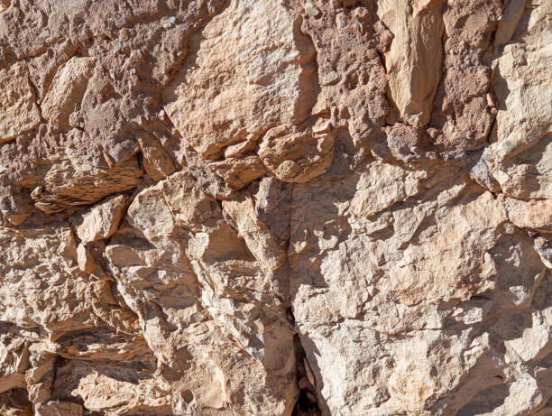 istock Abstract grunge background. Old brown rough stonewall texture. 1842746189