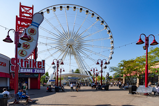 Media, PA, USA – May 17, 2014: People enjoy games, food and rides at a traveling summer fair.