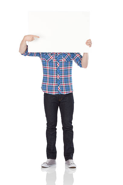 istock Man holding a placard in front of his face 184274709