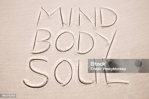 Mind Body Soul Inspiration Message Handwritten In Sand Stock Photo - Download Image Now