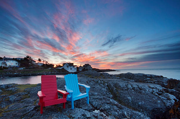 istock Red and blue lounge chairs in mountain sunset 184275734