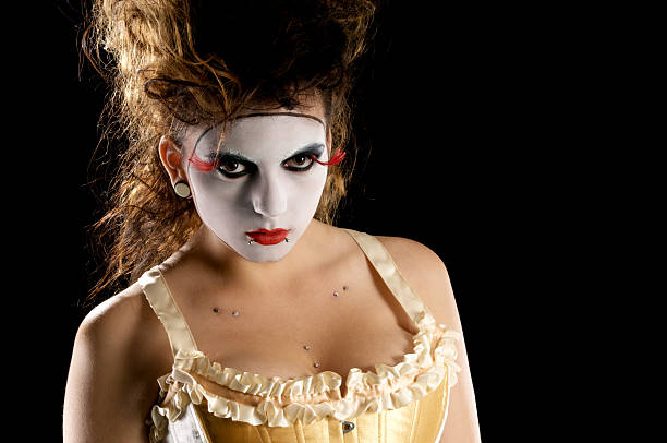istock Model in white face, big hair and corset. 184275743