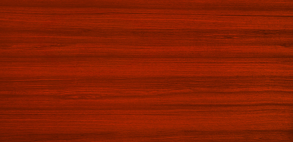 Planks of exterior wood, freshly painted in bright red.