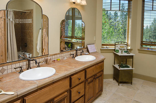 Bathroom with white ceramic Washbasin on marble countertop