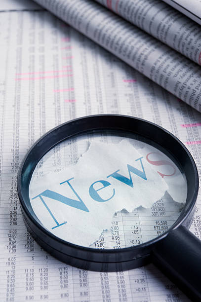 istock Magnifying Glass With Financial Report 184276991