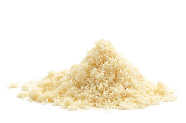 A pile of ground almond on a white background