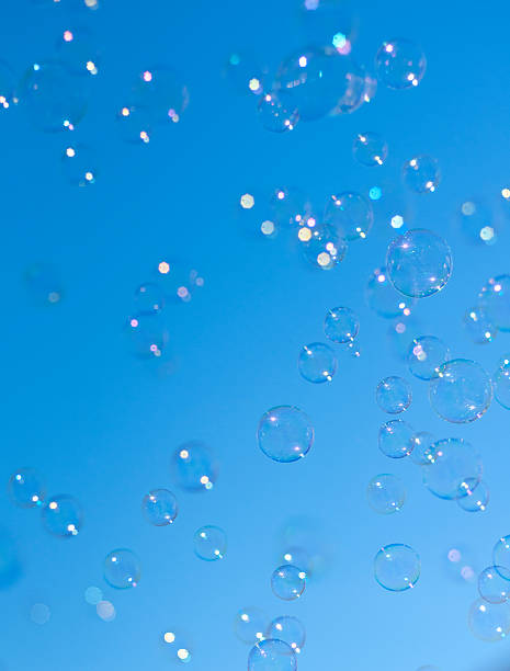 istock Bubbles flys through the air on a clear sky 184277462