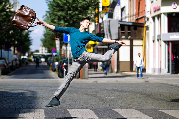 jumping over a pedestrian crossing stock photo