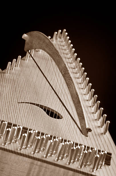 Bowed Psaltery Selective-focus image of a bowed psaltery (zither). psaltery stock pictures, royalty-free photos & images