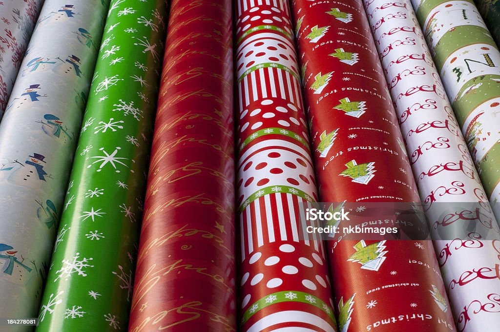 Rows Of Christmas Wrapping Paper Stock Photo - Download Image Now - Rolled  Up, Christmas Paper, Wrapping Paper - iStock