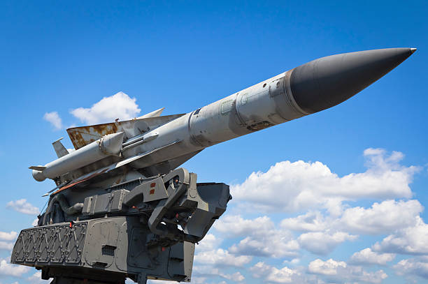 Military Air Missile Russian S-200 Wega - very long range, medium-to-high altitude surface-to-air missile against blue sky anti aircraft photos stock pictures, royalty-free photos & images