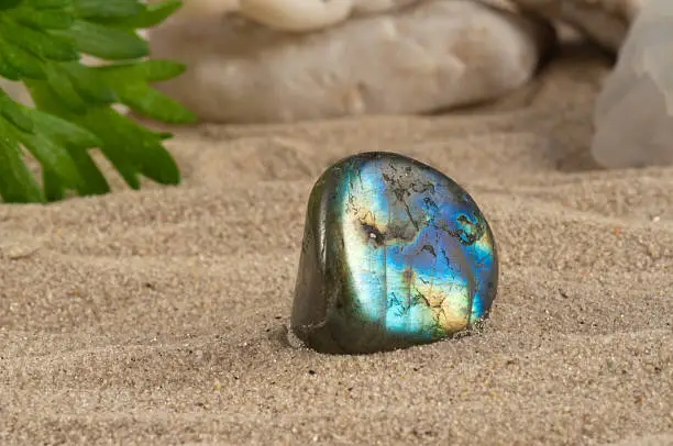 Photo collection of half-precious stones and gem stones. Here shown: The shiny Labradorite. 