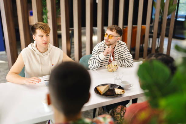 istock Colleagues eating lunch in their cafeteria 1842790429