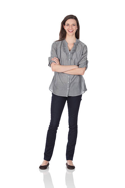 istock Happy woman standing with arms crossed 184279461